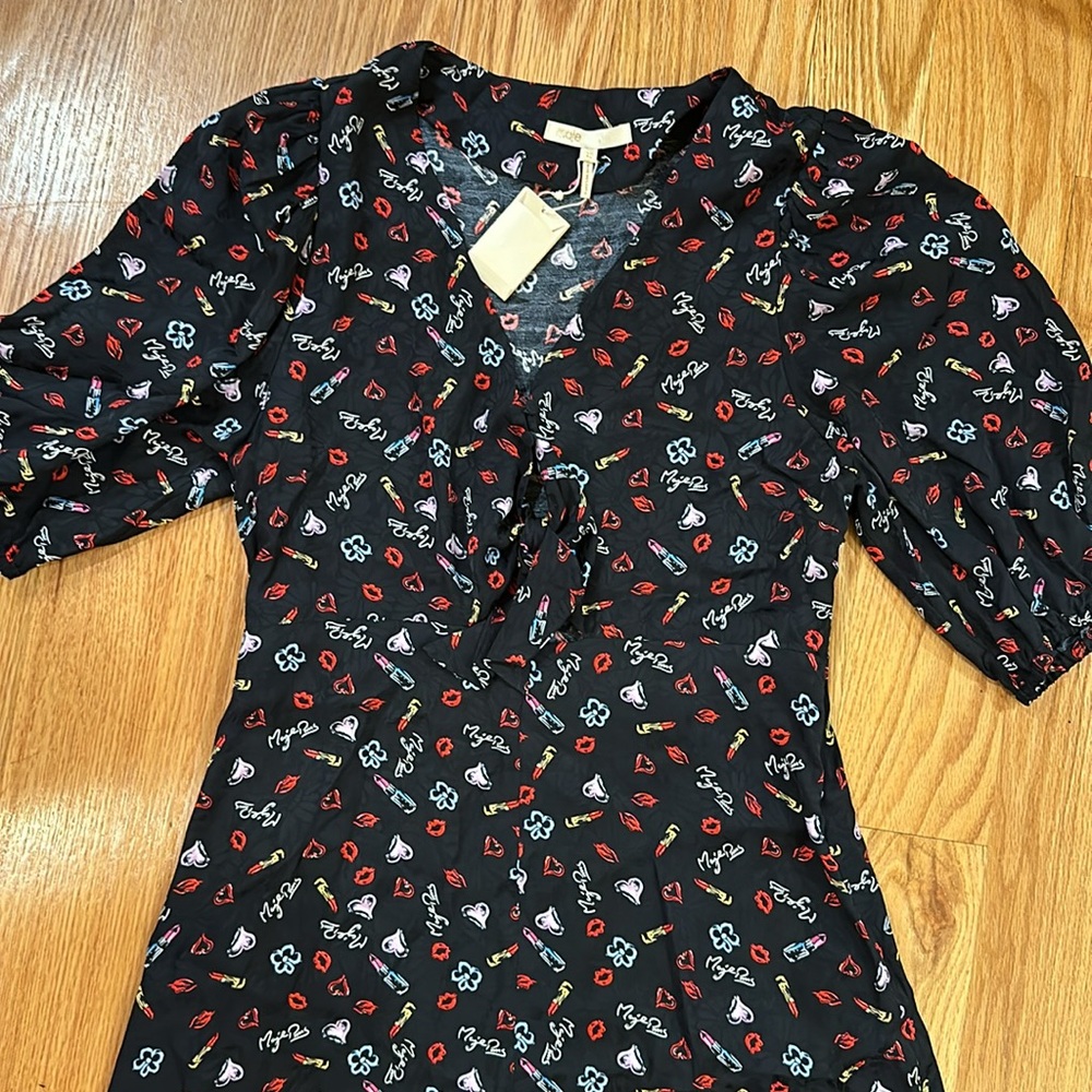 Maje mid-length lips, heart lipstick dress. Front ties around chest 2 buttons